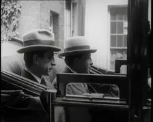 President of the Irish Republic Eamon De Valera Getting Into a Motorcar With a British Man..., 1921. Creator: British Pathe Ltd
