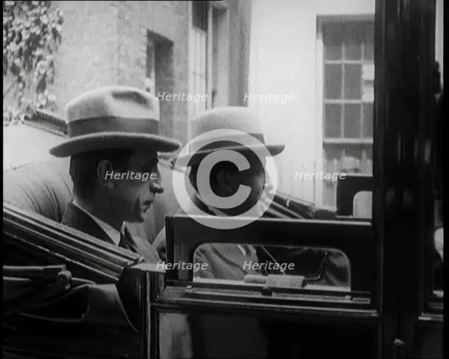 President of the Irish Republic Eamon De Valera Getting Into a Motorcar With a British Man..., 1921. Creator: British Pathe Ltd.