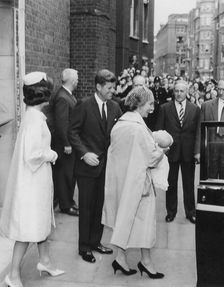President John F. Kennedy and his wife attend a christening at Westminster Cathedral, London, 1961