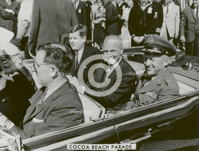President John F. Kennedy, John Glenn and General Davis in Cocoa Beach Parade, 1962.  Creator: NASA.
