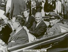 President John F. Kennedy, John Glenn and General Davis in Cocoa Beach Parade, 1962. Creator: NASA