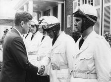 President John F. Kennedy saying farewell to German policemen in Bonn, Germany, 1963