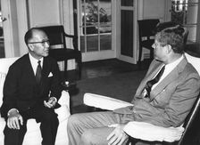 President John F. Kennedy talking with SEATO Secretary General Pote Sarasin, 1962. Creator: Unknown
