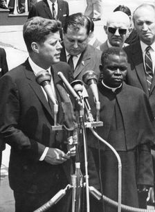 President John F. Kennedy with President Fulbert Youlou of Congo, Washington airport, 1961. Creator: Unknown
