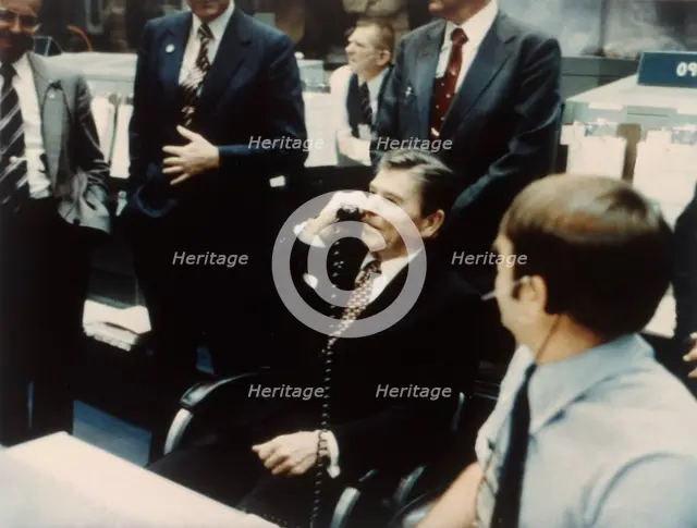 President Ronald Reagan speaks to astronauts on the Space Shuttle, 1981. Creator: NASA.