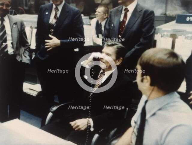 President Ronald Reagan speaks to astronauts on the Space Shuttle, 1981. Creator: NASA.