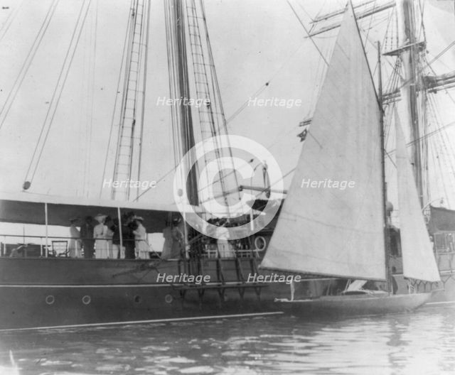Presidential yacht at Oyster Bay, L.I., 1905: guests standing amid ships, 1905. Creator: Frances Benjamin Johnston.