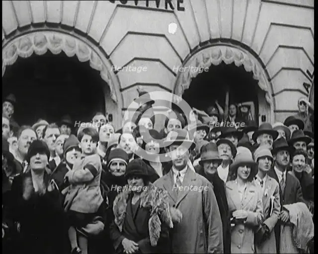 Press and Members of Public Watching Charles Lindbergh and Anne Morrow Lindbergh Waving..., 1920s. Creator: British Pathe Ltd.