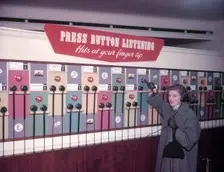 Press Button Listening HMV, Oxford Street, London, 1953. Creator: Arthur Charles Kirby Ware