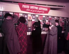 Press Button Listening HMV, Oxford Street, London, 1953. Creator: Arthur Charles Kirby Ware