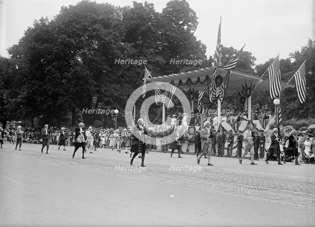 Preparedness Parade - Colonial Unit Passing Reviewing Stand, 1916. Creator: Harris & Ewing.