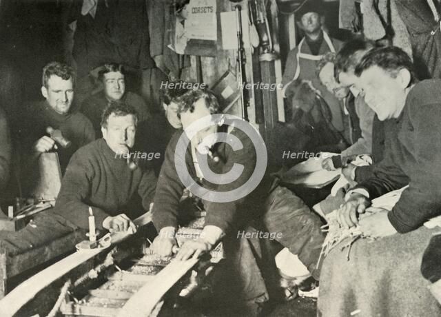 'Preparing A Sledge During the Winter', 1908, (1909). Artist: Unknown.