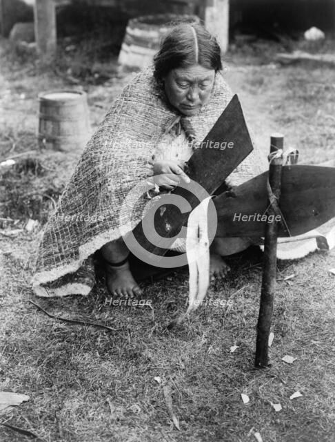 Preparing cedar bark-Nakoaktok, c1914. Creator: Edward Sheriff Curtis.