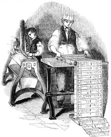 Preparing punched cards for a Jacquard loom, 1844