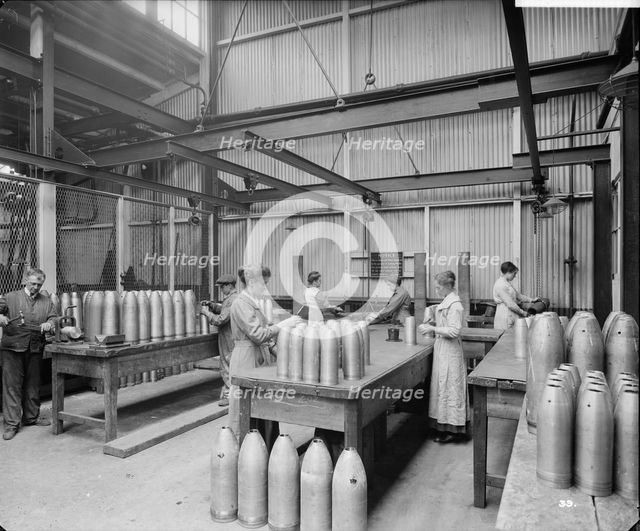 Preparing projectile heads at Cunard Shell Works, Merseyside, 1917. Artist: Bedford Lemere and Company