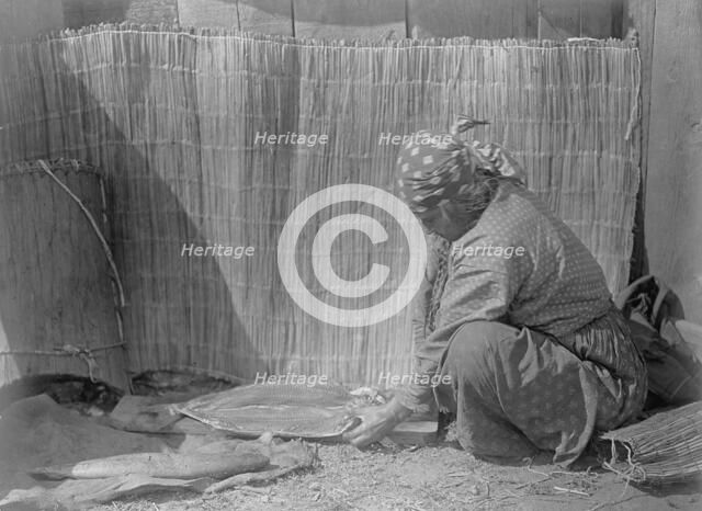 Preparing salmon-Wishram, c1910. Creator: Edward Sheriff Curtis.
