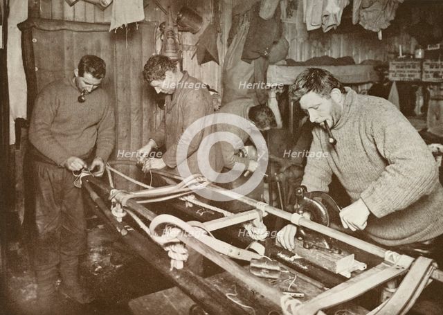 'Preparing Sledges for the Polar Journey (Crean, Forde, Lashly, P.O. Evans)', c1911, (1913).  Artist: Herbert Ponting.