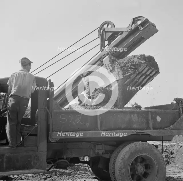 Preparing the ground for the construction of emergency buildings..., Washington, D.C, 1942. Creator: Gordon Parks.