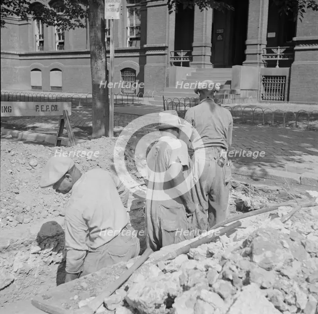 Preparing the ground for the construction of emergency buildings..., Washington, D.C, 1943. Creator: Gordon Parks.