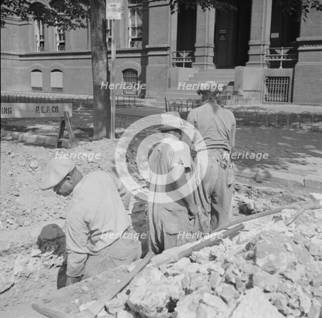 Preparing the ground for the construction of emergency buildings..., Washington, D.C, 1943. Creator: Gordon Parks.