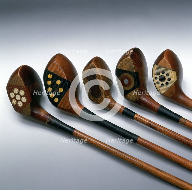 'Pretty faces' golf clubs, 1920s. Creator: Unknown.