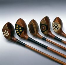 Pretty faces golf clubs, 1920s. Creator: Unknown