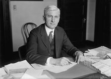 Price, Oscar E., Director Publicity, 2nd Liberty Loan. at Desk, 1917. Creator: Harris & Ewing