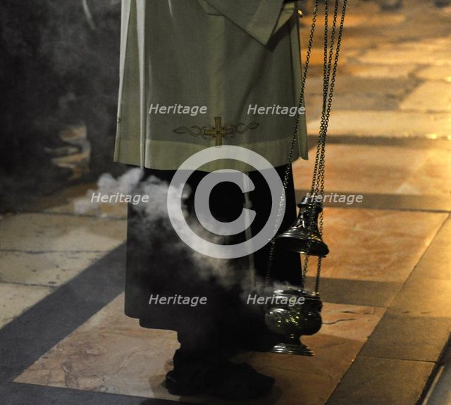 Priest uses incense, Jerusalem, Israel, 2014.  Creator: LTL.