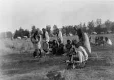 Priests passing before the pipe-Cheyenne, c1910. Creator: Edward Sheriff Curtis