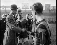 Prince Albert, Duke of York, Shaking Hands With Football Team at West Ham Before a Match, 1922. Creator: British Pathe Ltd