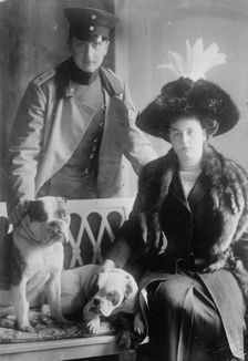 Prince and Princess August Wilhelm von Preussen with dogs, 1912. Creators: Bain News Service, George Graham Bain