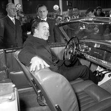 Prince Bertil tests a convertible Mercedes Benz at the car showroom in Stockholm, 1954. Creator: Unknown