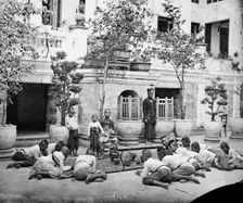 Prince Chulalongkorn of Siam [Thailand] (seated, centre), with Prince Bhanugrangsi Savan..., 1866. Creator: John Thomson