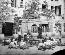 Prince Chulalongkorn of Siam [Thailand] (seated, centre), with Prince Bhanugrangsi Savan..., 1866. Creator: John Thomson