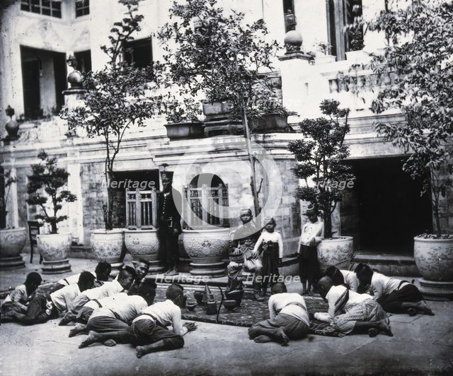 Prince Chulalongkorn of Siam (Thailand) (seated, centre), with Prince Bhanugrangsi..., 1866. Creator: John Thomson.