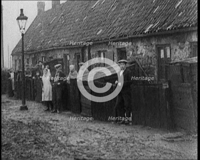 Prince Edward, Prince of Wales Inspecting Working Class Homes in the North of England, 1929. Creator: British Pathe Ltd.