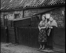 Prince Edward, Prince of Wales Inspecting Working Class Homes in the North of England, 1929. Creator: British Pathe Ltd