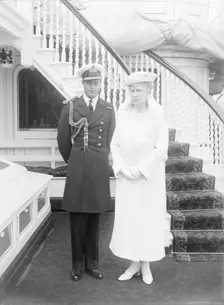 Prince George and Queen Mary aboard HMY Victoria and Albert c1933. Creator: Kirk & Sons of Cowes