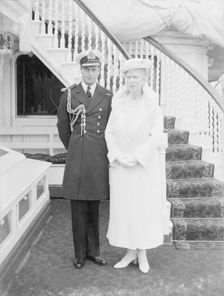 Prince George and Queen Mary aboard HMY Victoria and Albert c1933. Creator: Kirk & Sons of Cowes