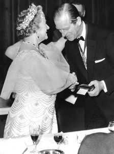 Prince Philip presents the Queen Mother with the Albert Medal, Royal Society of Arts, London, 1974. Creator: Unknown
