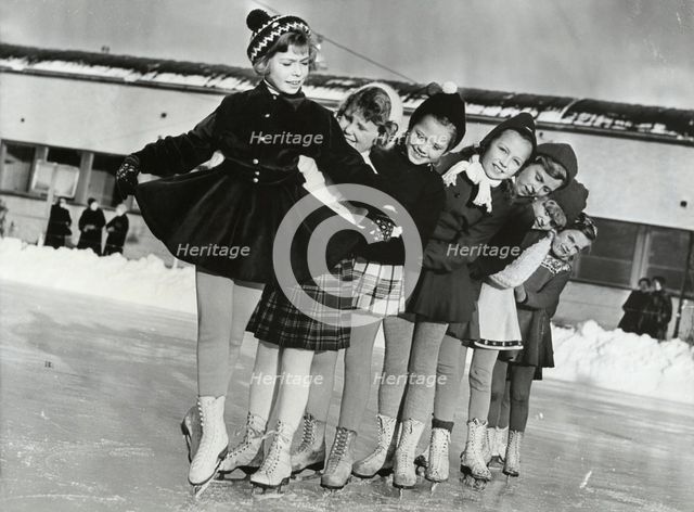 Princess Christina of Sweden, the ice princess, with friends, 1953. Creator: Unknown.