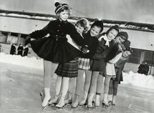 Princess Christina of Sweden, the ice princess, with friends, 1953. Creator: Unknown