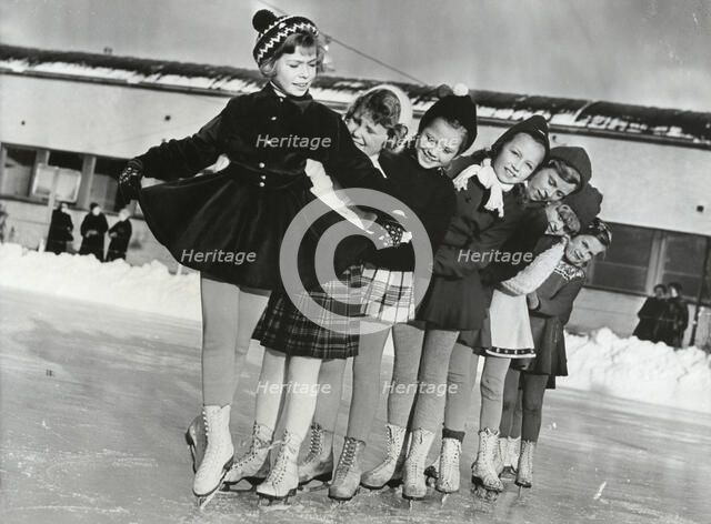 Princess Christina of Sweden, the ice princess, with friends, 1953. Artist: Unknown