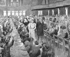Princess Alexandra...attending one of her dinners for poor children... c1897, (1901). Creator: Unknown