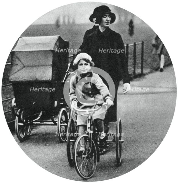 Princess Elizabeth riding a tricycle, March 1932, (1937). Artist: Unknown