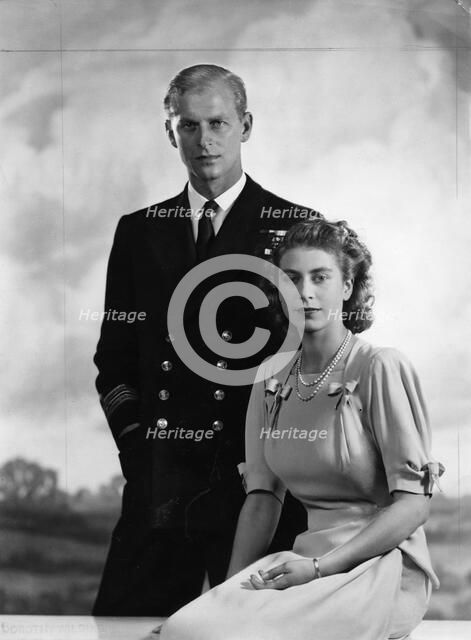 Princess Elizabeth with Lieutenant Philip Mountbatten, 9 July 1947.  Creator: Dorothy Wilding.