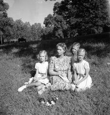 Princess Sibylla with the little princesses in Hagaparken, Stockholm, Sweden, 17/8 1944. Creator: Unknown