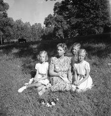 Princess Sibylla with the little princesses in Hagaparken, Stockholm, Sweden, 17/8 1944. Creator: Unknown