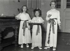 Princesses Birgitta, Desiree and Margaretha of Sweden, St Lucy's Day, 1943. Creator: Karl Sandels