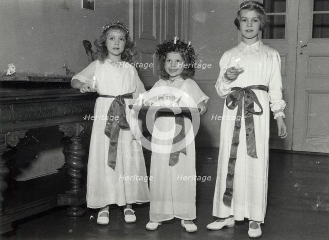 Princesses Birgitta, Desiree and Margaretha of Sweden, St Lucy's Day, 1943. Creator: Karl Sandels.